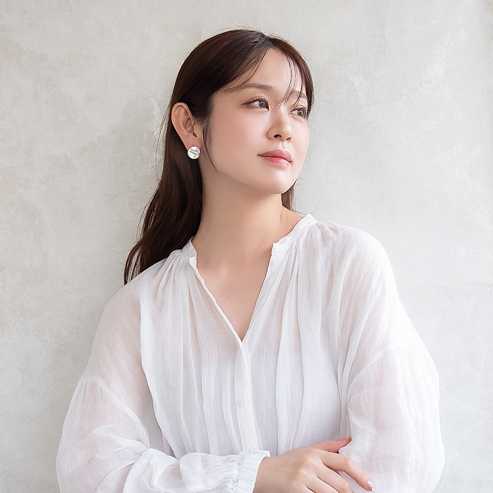 ピアス ニッケルフリー neige. サークル 凸凹 スタッドピアス