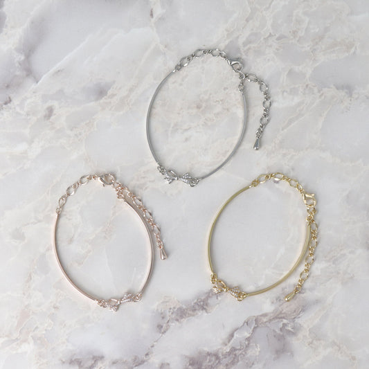 ブレスレット ニッケルフリー メタル キュービックジルコニア ミニ リボン カーブ バー チェーンブレスレット