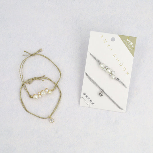 ブレスレット ANTI SHOCK 静電気軽減 ニッケルフリー メタル バブル パール ストーン ラメ糸 2本セット ゴムブレスレット