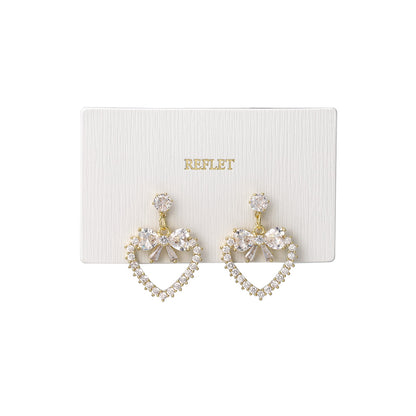 ピアス ニッケルフリー メタル キュービックジルコニア リボン ハート ステンレスポスト スタッドピアス