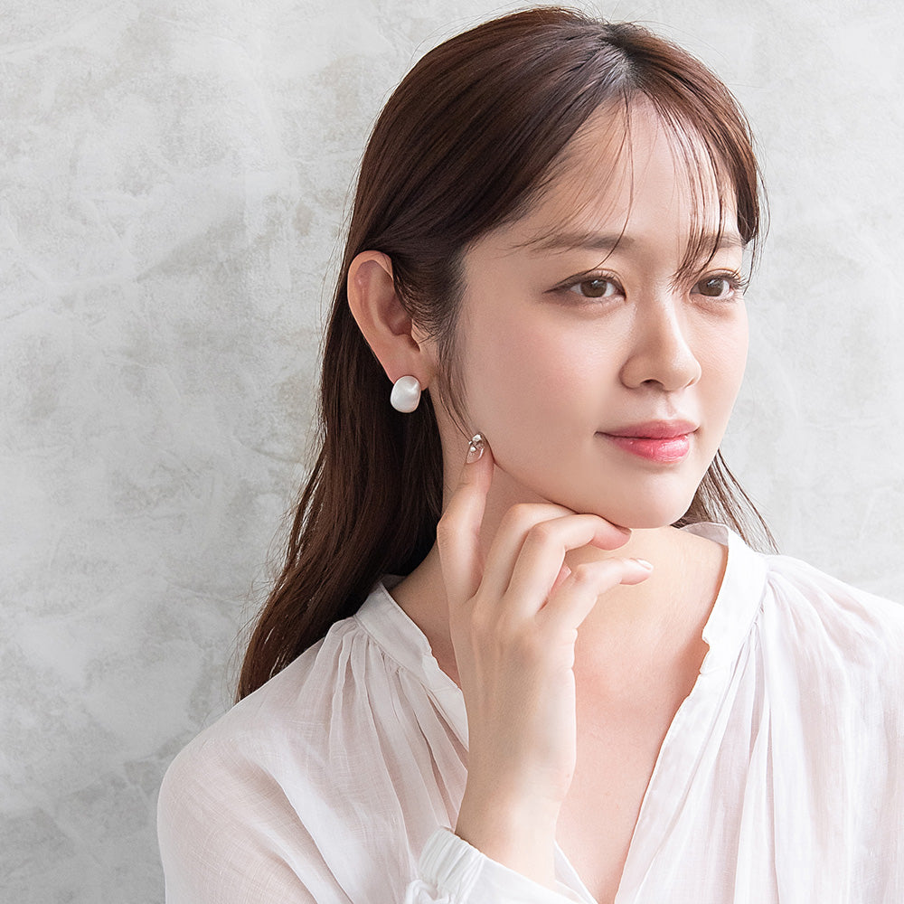 ピアス  ニッケルフリー neige. オーバル カーブ スタッドピアス