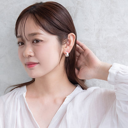 ピアス  ニッケルフリー neige. 凸凹 カーブ スタッドピアス