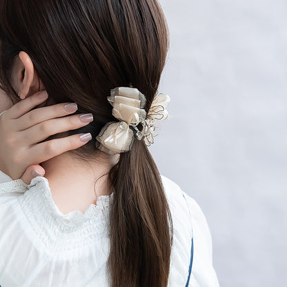 ヘアクリップ シアー フリル リボン ストーン ロール バンスクリップ