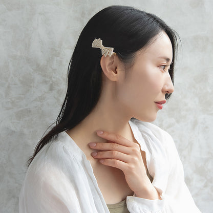 ヘアクリップ NOUVE. メニー ストーン パール リボン サイドクリップ