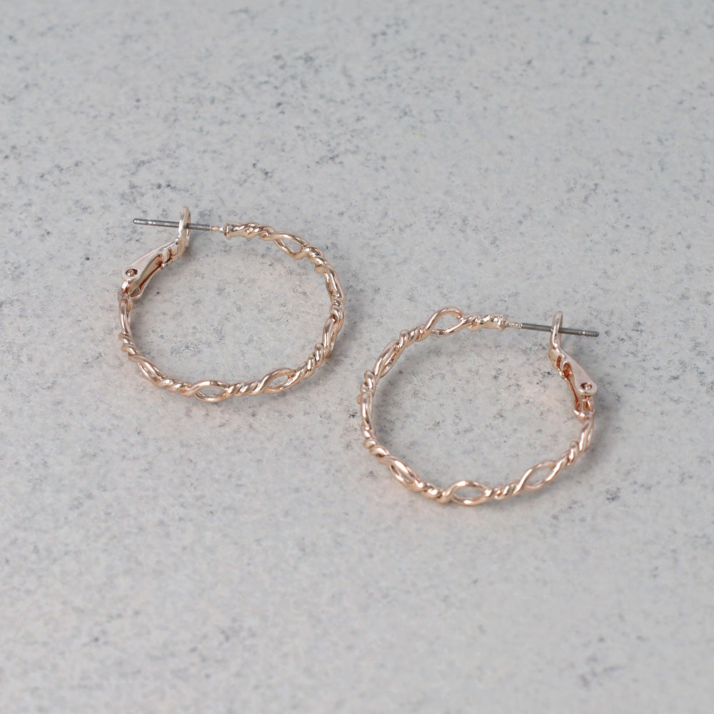 ピアス ニッケルフリー ロゼシルバー ランダム ひねり オーバル チタンポスト フープピアス