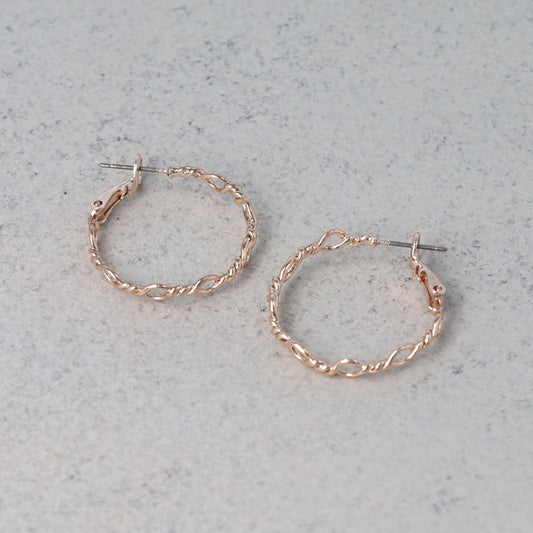 ピアス ニッケルフリー ロゼシルバー ランダム ひねり オーバル チタンポスト フープピアス